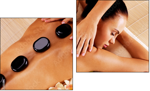 Adult woman having hot stone massage in spa salon - Two-piece canvas print, Diptych