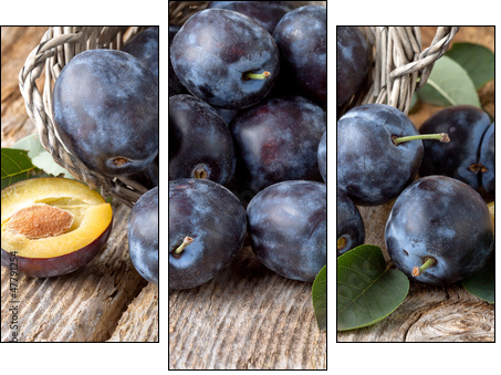 group of fresh plums on wood  background - Three-piece canvas print, Triptych
