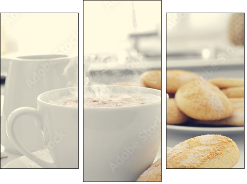 cappuccino and biscuits on the kitchen table - Three-piece canvas print, Triptych