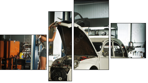A beautiful brunette woman in a garage fixing an old car - Four-piece canvas print, Fortyk