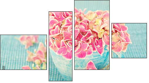 Pink hydrangea flowers in a cup on a blue background . - Four-piece canvas print, Fortyk