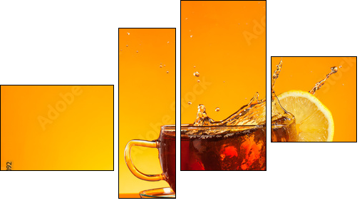Tea splashing out of glass with orange background - Four-piece canvas print, Fortyk