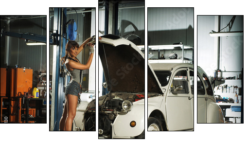 A beautiful brunette woman in a garage fixing an old car - Five-piece canvas print, Pentaptych